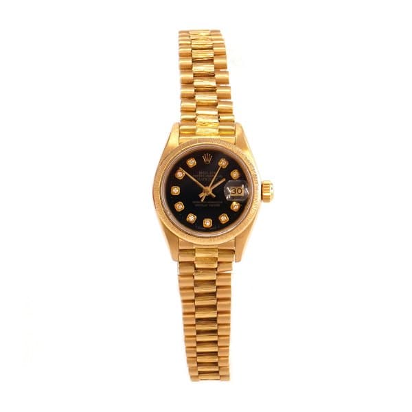 Rolex Oyster Perpetual Datejust ref. nr 69178 i 18kt guld og sort skive med diamanter som timemarkører